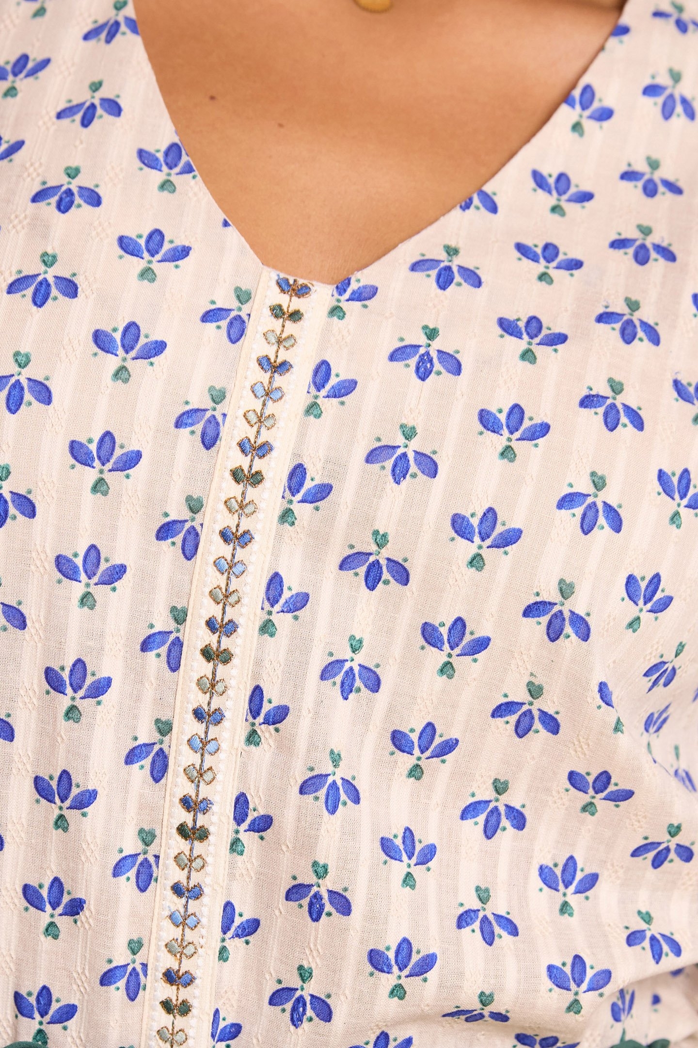 OFF-WHITE TOP WITH BLUE PETAL PRINT 6