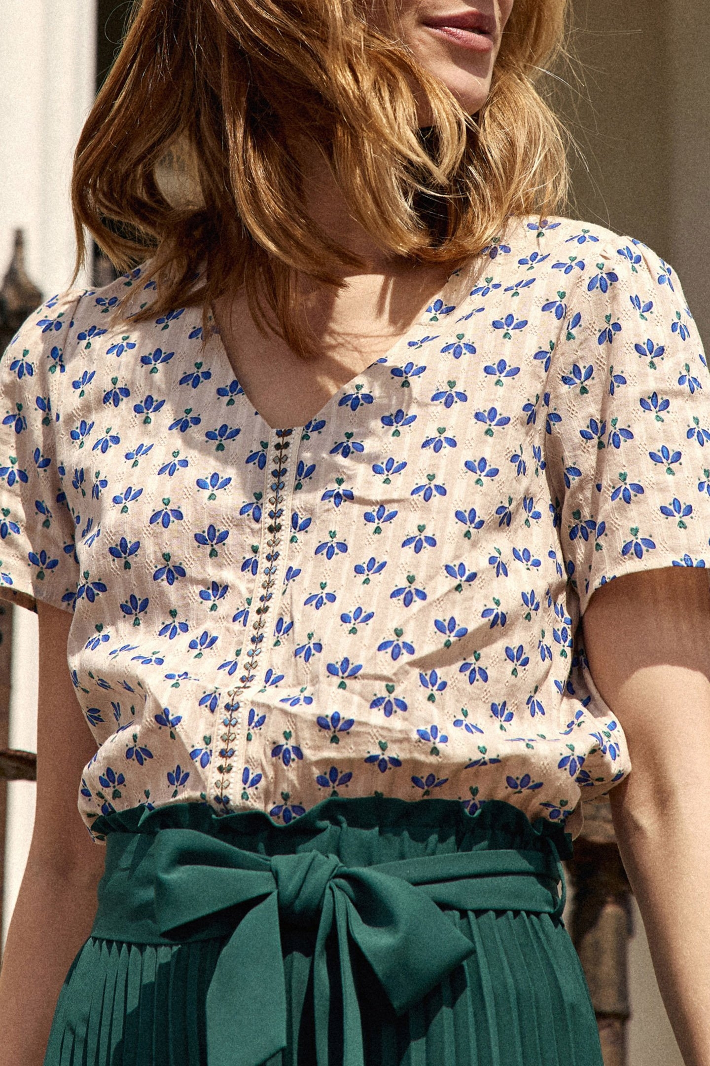 OFF-WHITE TOP WITH BLUE PETAL PRINT 8