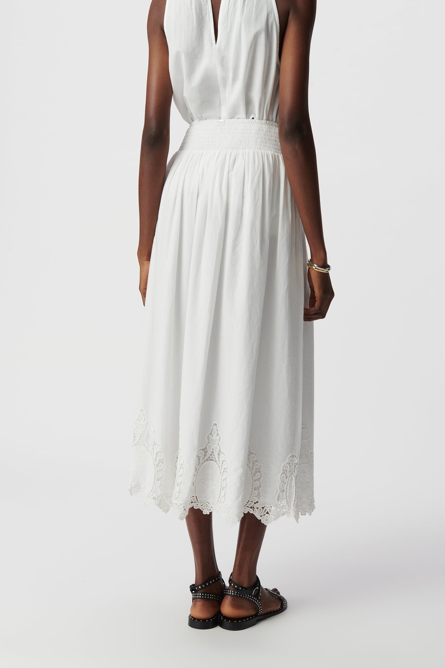 LONG WHITE SKIRT DECORATED WITH LACE EMBROIDERY 4