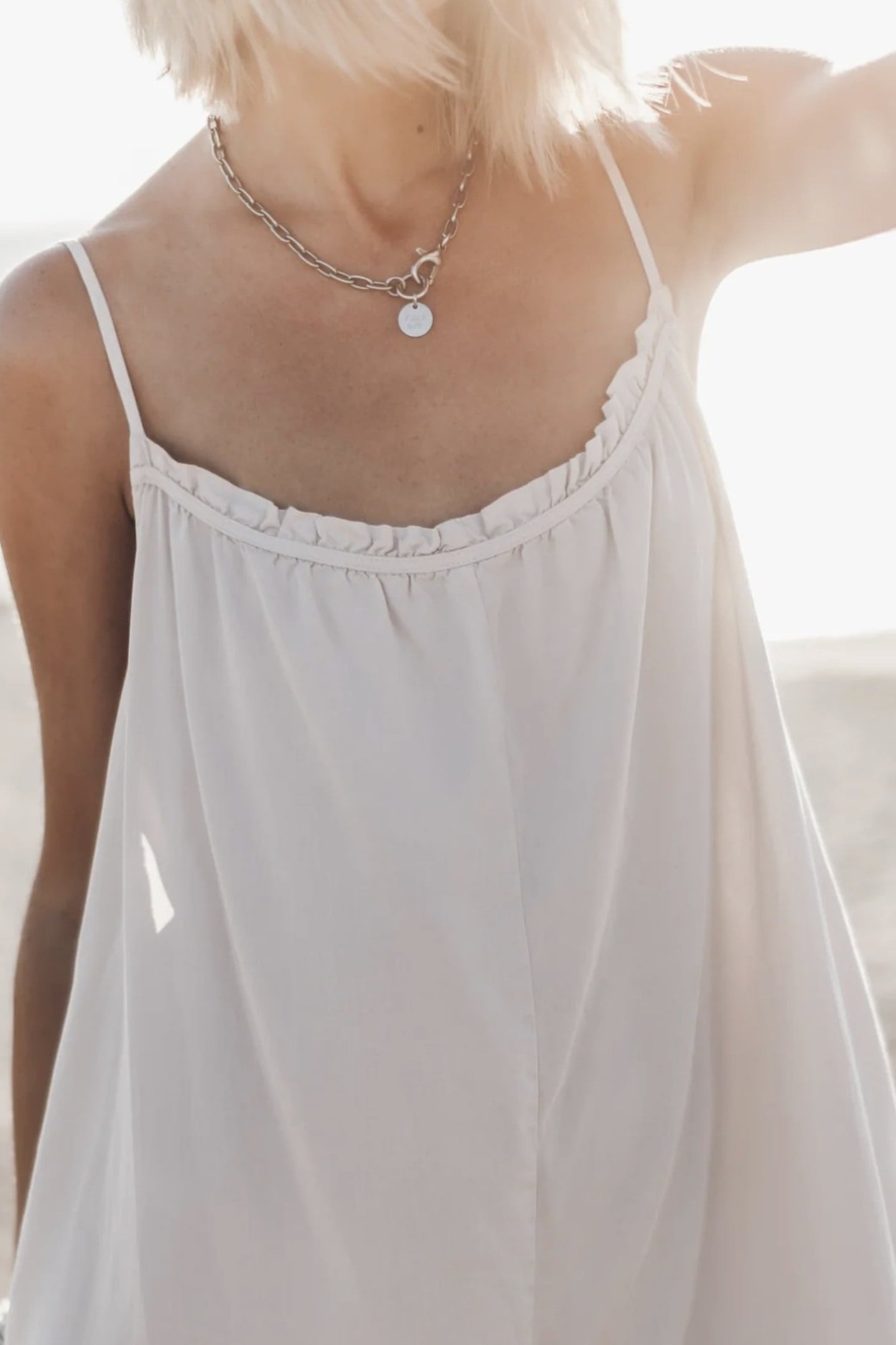 THE LIGHT SHORT FLOWY JUMPSUIT WHITE 2
