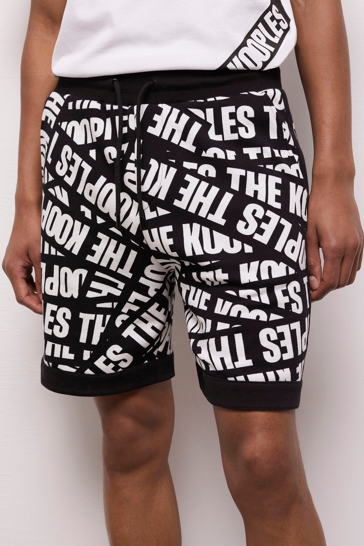 SHORT LOGO TAPE ALL OVER BLACK/WHITE 1